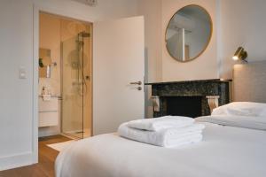 Una cama o camas en una habitación de Urbanchic atmosphère 2D