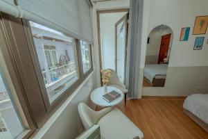 Postel nebo postele na pokoji v ubytování Dreamy Hotel Dalat