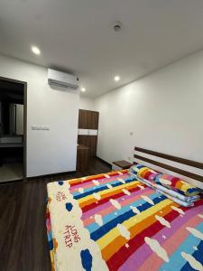 Giường trong phòng chung tại Nancy Homestay - Hoang Huy Commerce Apartment