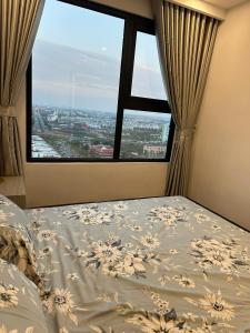 Giường trong phòng chung tại Nancy Homestay - Hoang Huy Commerce Apartment