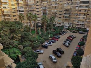 an aerial view of a parking lot in a city at Where landsacpe view meets Luxury in Cairo