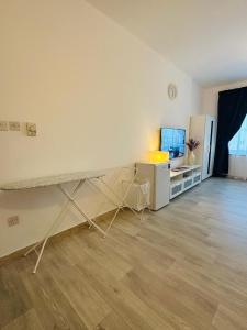 TV a/nebo společenská místnost v ubytování SG Homes