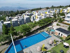 an aerial view of a apartment complex with a swimming pool at Valle Verde Villas in Bandung