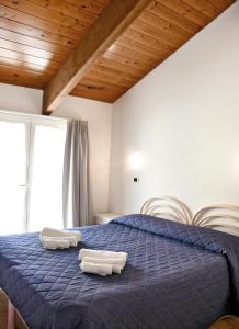Postel nebo postele na pokoji v ubytování Hotel Edera - in pieno Centro a pochi passi dal Mare