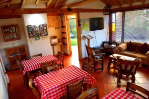 TV a/nebo společenská místnost v ubytování Hostal Renacer
