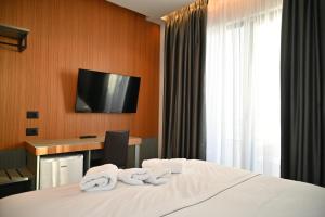 TV a/nebo společenská místnost v ubytování Adria Palace