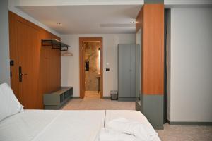 Postel nebo postele na pokoji v ubytování Adria Palace