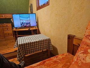 Televiisor ja/või meelelahutuskeskus majutusasutuses Gite en Alsace