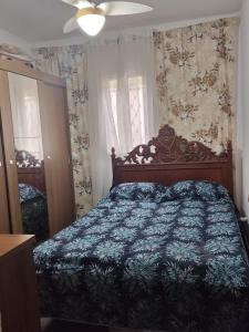 Ένα ή περισσότερα κρεβάτια σε δωμάτιο στο Sua casa no Guaru