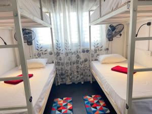 Voodi või voodid majutusasutuse Hiricurry Hostel & Restaurant toas