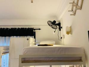 Voodi või voodid majutusasutuse Hiricurry Hostel & Restaurant toas