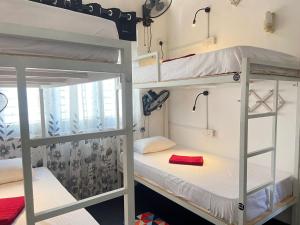 Voodi või voodid majutusasutuse Hiricurry Hostel & Restaurant toas