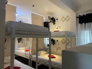 Voodi või voodid majutusasutuse Hiricurry Hostel & Restaurant toas