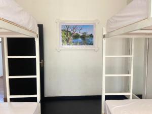 Voodi või voodid majutusasutuse Hiricurry Hostel & Restaurant toas