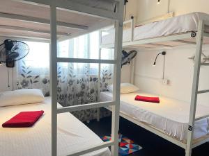 Voodi või voodid majutusasutuse Hiricurry Hostel & Restaurant toas