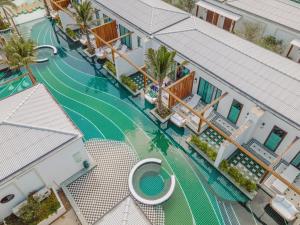 an overhead view of a swimming pool at a resort at Sugar Marina Resort-LAGOON-Villas, Naiyang Beach in Nai Yang Beach +159 photos
