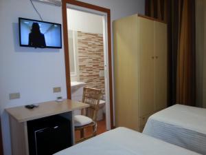 A bed or beds in a room at Villa Betta