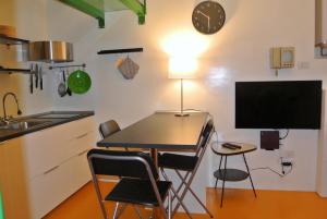 A kitchen or kitchenette at Duomo House