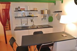 A kitchen or kitchenette at Duomo House