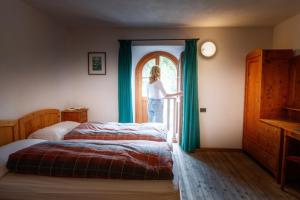 Postel nebo postele na pokoji v ubytování Rifugio Ghiacciaio dei Forni