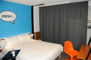Postel nebo postele na pokoji v ubytování Ibis Styles Chambery Centre Gare