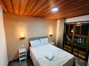 Postel nebo postele na pokoji v ubytování Duplex Villas Areias do Patacho - Praia do Patacho - Porto Pedras