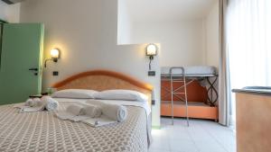 Postel nebo postele na pokoji v ubytování Hotel Nobel - Soft All Inclusive