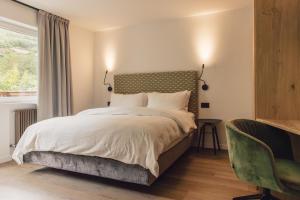 Postel nebo postele na pokoji v ubytování Pomella's Guesthouse