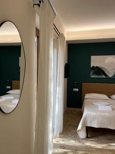 Postel nebo postele na pokoji v ubytování B&B Casa Doria
