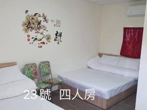 Voodi või voodid majutusasutuse Yilan B&B toas