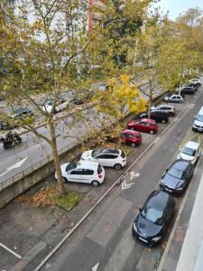 an aerial view of cars parked on a city street at Tete d or in Caluire-et-Cuire