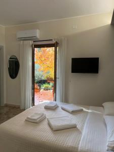 Postel nebo postele na pokoji v ubytování B&B Casa Doria