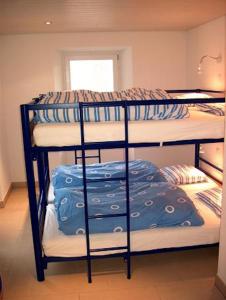 Postel nebo postele na pokoji v ubytování B&B Les Rochers 42 lits