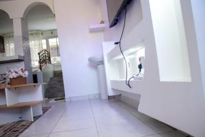 Μια τηλεόραση ή/και κέντρο ψυχαγωγίας στο Ella homes