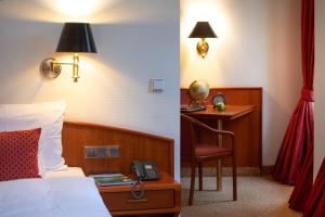 Postelja oz. postelje v sobi nastanitve Romantik Hotel Bülow Residenz