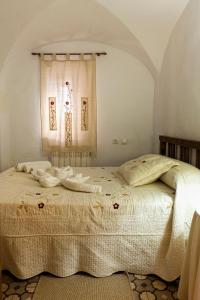 Postel nebo postele na pokoji v ubytování Apartamentos Rurales La Casa de Luis