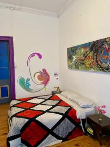 Postel nebo postele na pokoji v ubytování Art Hostel Casa Chaman