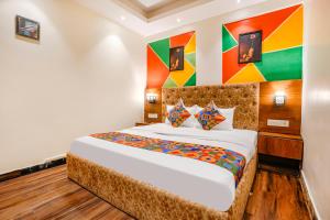 Postel nebo postele na pokoji v ubytování FabHotel Twigo Inn