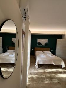 Postel nebo postele na pokoji v ubytování B&B Casa Doria