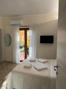 Postel nebo postele na pokoji v ubytování B&B Casa Doria