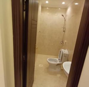 Koupelna v ubytování Al tawfeeg hotel - Al Azizyah