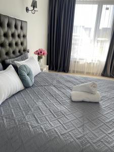 En eller flere senge i et værelse på 30# Galileo Terrace