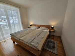 Postel nebo postele na pokoji v ubytování Ferienwohnung Blick Martennock + 19 fotografií