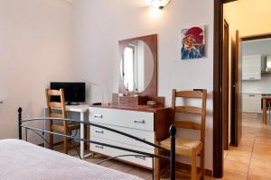 Postel nebo postele na pokoji v ubytování Tenuta Paradiso