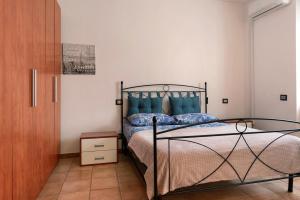 Postel nebo postele na pokoji v ubytování Tenuta Paradiso