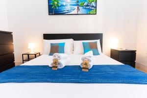 Katil atau katil-katil dalam bilik di 3 Suite in Centro con Balcone a 450 m dal Mare, Parcheggio Pubblico +42 gambar