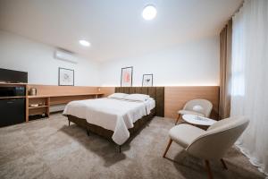 Posteľ alebo postele v izbe v ubytovaní Apartmány Reduta - new