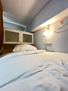 Phak Phing Hostel客房内的一张或多张床位