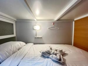 Phak Phing Hostel客房内的一张或多张床位
