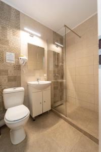 Koupelna v ubytování Hotel Cirus